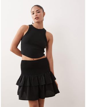 Vila Mini-jupe à taille froncée et volants étagés - Noir