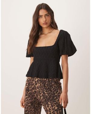 Gina Tricot Wavy Textured Jersey With Puff Sleeves And Peplum Hem - Black