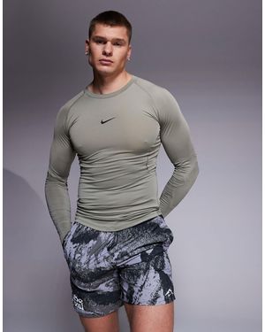 Nike Nike pro training – dri-fit – eng anliegendes, langärmliges oberteil - Grau