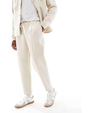 ASOS Tapered Fit Fixed Hem joggers With Pleats - White