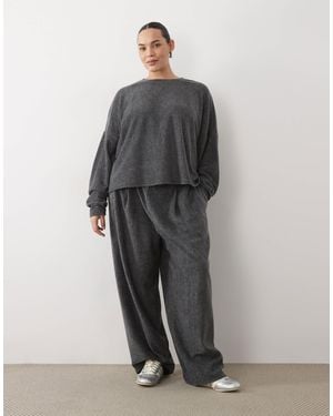 ASOS Asos design curve top ample à manches longues en polaire légère à coordonner, anthracite - Gris
