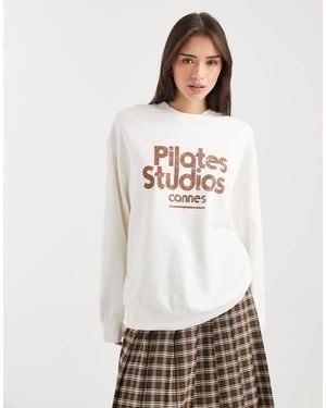 ASOS Oversized Sweatshirt With Pilates Studio Graphic - White