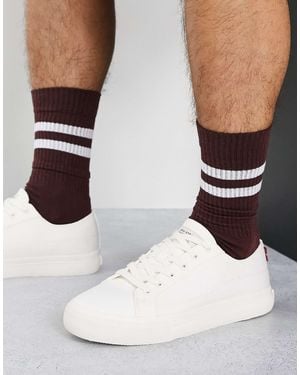 Levi's – deacon – sneaker mit rotem logoetikett - Weiß