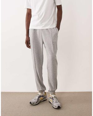 ASOS Slim-Fit Joggingbroek Met Plat Gestikte Plooien - Naturel