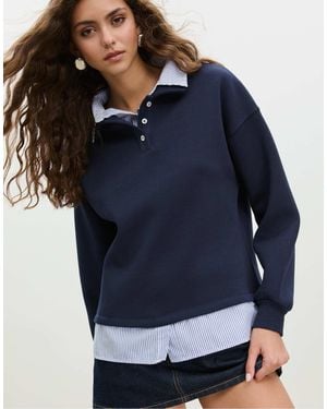 Stradivarius – polo-sweatshirt aus zwei materialien - Blau