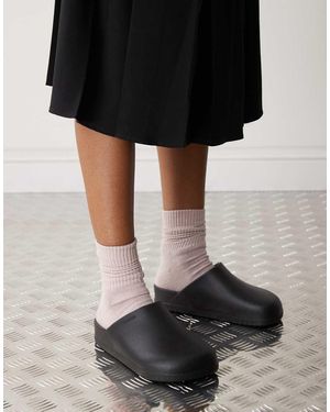 Crocs™ Zuecos Negros Dylan De
