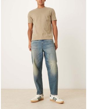 ASOS Vaqueros Azules De Corte Tapered Holgado Con Lavado Oscuro Tintado De