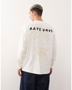 Aape By A Bathing Ape Aape by a bathing ape - t-shirt coupe carrée à manches longues avec motifs imprimés - cassé - Blanc