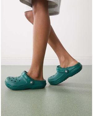 Crocs™ Zuecos Esmeralda Oscuro Clásicos Con Forro De Felpa De - Verde