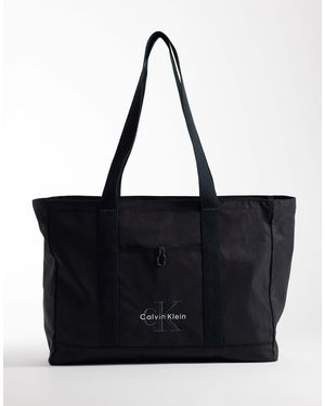 Calvin Klein Grand cabas en nylon à logo - Noir