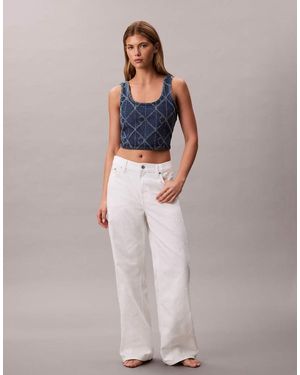 Calvin Klein Laser Cut Repeat Logo Low Rise baggy Jeans - Multicolour