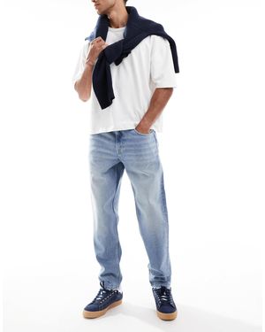 ASOS – schmal zulaufende jeans - Blau