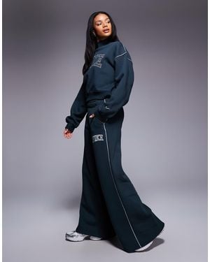 Nike Retro Logo Wide Leg joggers - Blue