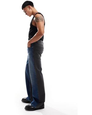ASOS Jeans Ampi A Zampa Lavaggio Medio Con Cuciture A Contrasto - Blu