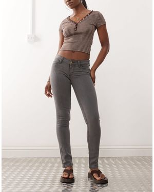 Cheap Monday Sleezie - jean skinny ultra stretch à taille basse - délavé - Gris