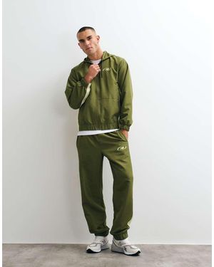 New Balance Trackside Woven Pant - Green