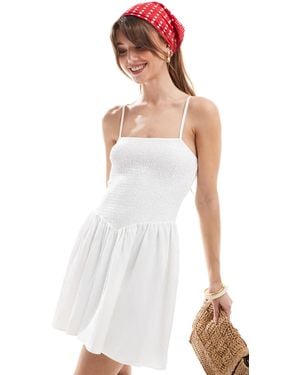 The Frolic Exclusive Cami Square Neck Shirred Dropped Waist Mini Dress - White