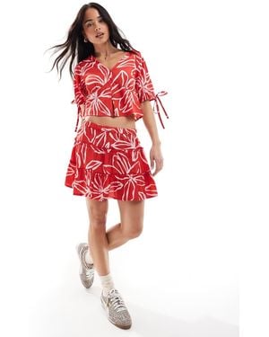 Wednesday's Girl Bold Bloom Print Mini Skirt - Red