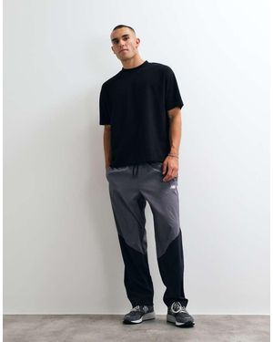 New Balance Sport Legacy Pant - Blue