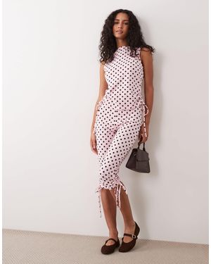ASOS Capri à pois à nouer sur le côté - Rose