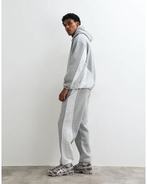 ASOS Tapered jogger With Cut And Sew And Piping - White