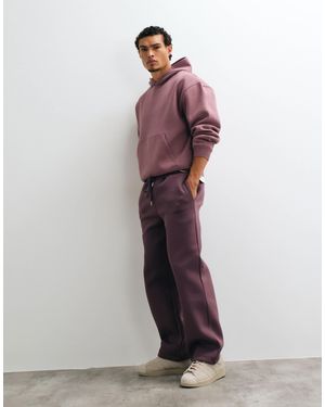 ASOS Jogger large en tissu style scuba avec broderie marron - Violet