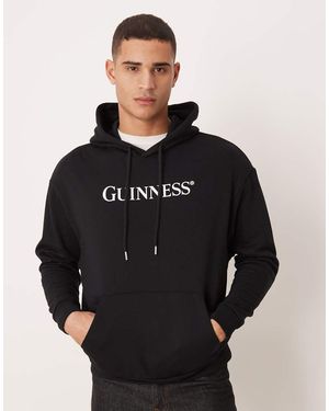 ASOS Sudadera Negra Holgada Con Capucha Y Estampado De Guinness De - Negro