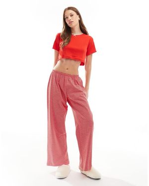 Wednesday's Girl Pigiama Con Pantaloni A Righe E T-Shirt Traforata - Rosso