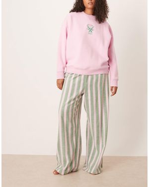 ASOS Asos Design Curve Logo Jersey Sweatshirt Pajama Set With Woven Stripe Trouser - Pink