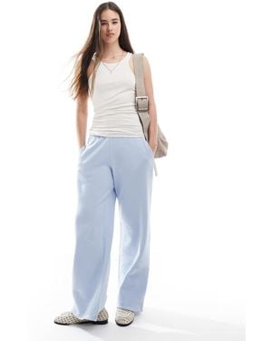 Hollister Mid Rise Wide Leg Graphic Trackies - Blue