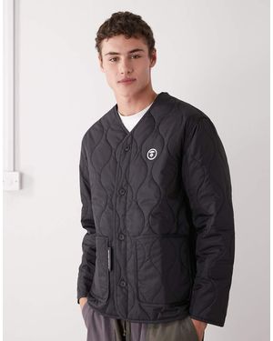 Aape By A Bathing Ape Chaqueta Negra Acolchada Con Forro De X Alpha Industries - Azul