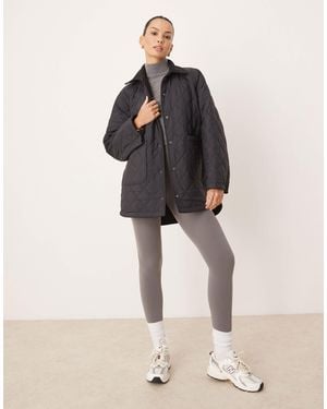 Tala Oversized Reversible Fleece And Quilted Jacket - Black