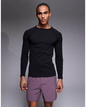 4505 Seamless Rib Slim Fit Long Sleeve Raglan Top - Black