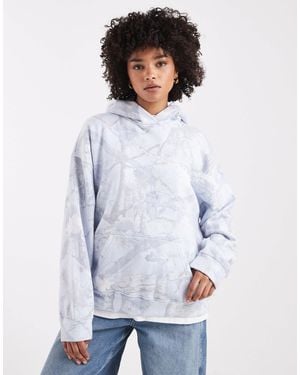 Hollister Sweat à capuche coupe boyfriend avec petit logo - clair à imprimé abstrait - Blanc