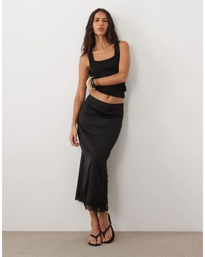 Vila Jupe midi en satin à bordure en dentelle e - Noir
