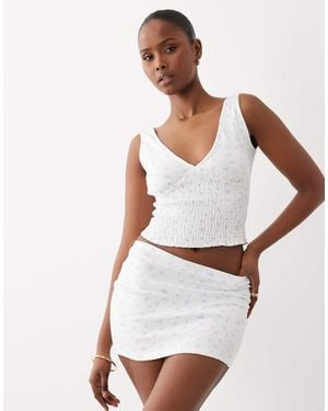 The Frolic Exclusive Plunge Neck Shirred Waist Top - White