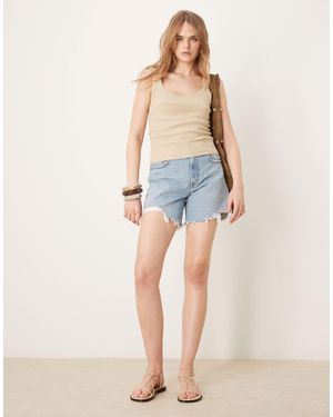 Abercrombie & Fitch Short style années 90 à bords effilochés - moyen délavé - Bleu