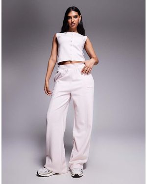 Kaiia Joggers A Fondo Ampio Chiaro Con Cuciture E Logo - Viola