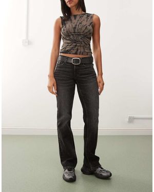 Weekday Vaqueros Bootcut De Corte Slim Con Lavado Negro Desigual Tension De