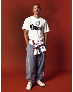 Bershka Pantaloni Tecnici Baggy Chiaro - Rosso