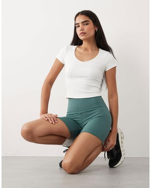 4505 – icon – trainings-leggingshorts - Grün