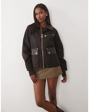 Barbour Donnington - veste cirée avec détail en pu - Noir