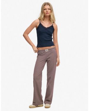 Superdry – athletic essentials – gestreifte jersey-hose - Blau