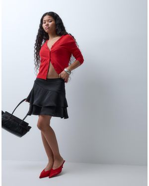 Vero Moda Mini-jupe à étages avec détail à la taille e - Rouge