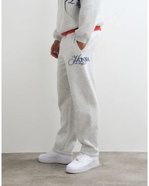 ASOS Straight Leg jogger With Print - White