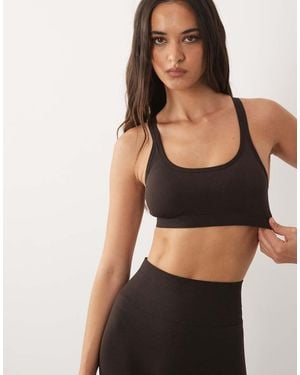 4505 Seamless Shine Light Support Sports Bra With Removable Padding - Black