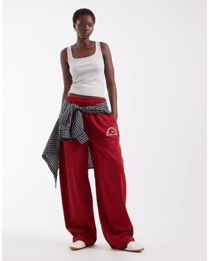 ASOS Weekend Collective Tall Co-ord Barrel Leg sweatpants With Graphic - Red