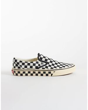 Vans Classic slip-on baskets à damier et blanc