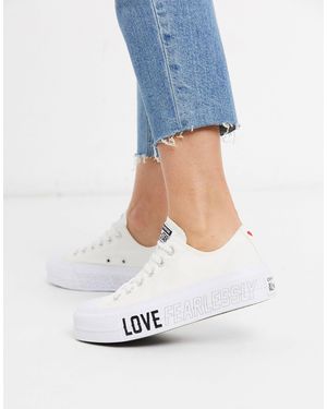 Converse Chuck Taylor - Baskets à semelles plateformes et motif cœur - Blanc