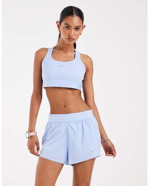 Nike Pantalones Cortos Azules De Talle Medio Con Diseño 2 En 1 Swift Dri-Fit De - Blanco